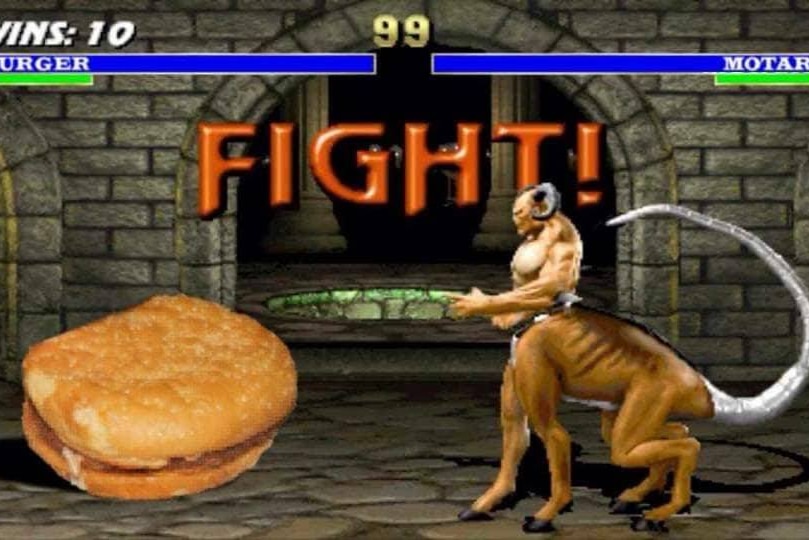 A burger appears in a computer game facing a creature with a human torso.