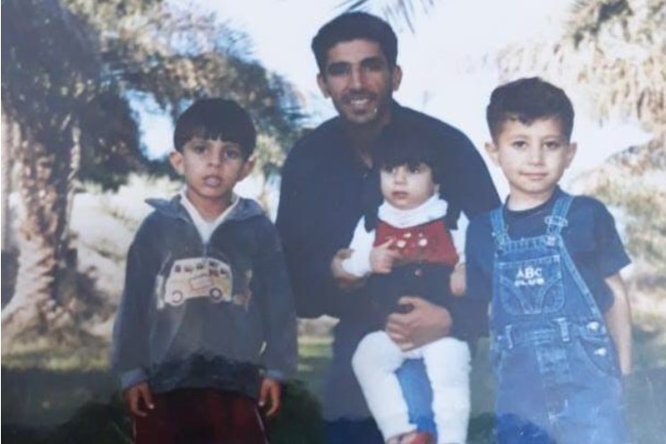 An old photo of Malek Khaledi with his nephews.