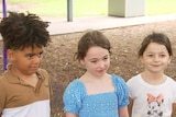 Three children starting in a park 
