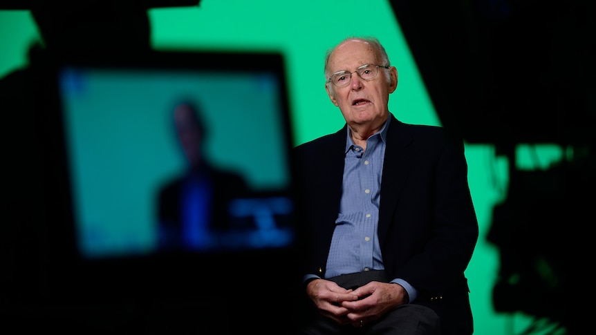 Gordon Moore in front of a camera. 