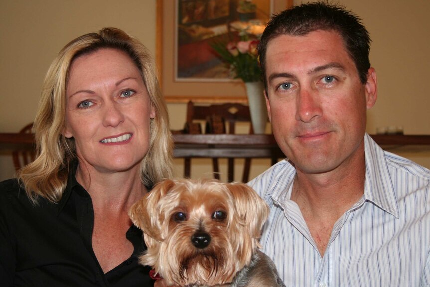 Julie and Marcus Lee, and their dog Dudley, in Dubai.