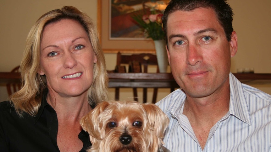 Julie and Marcus Lee, and their dog Dudley, in Dubai.
