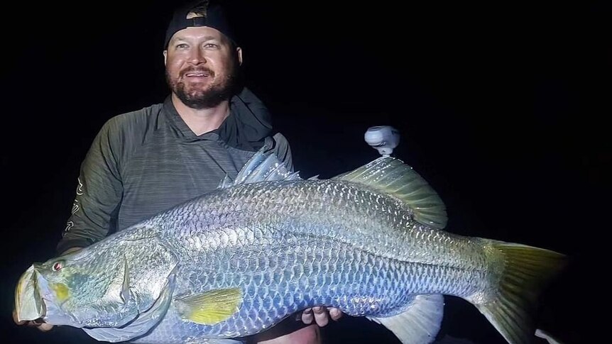 Jason Gerdes and one of the billabong fish that helped him take out the Top End Barra Series round. 