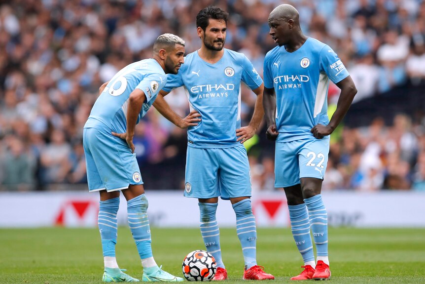 Manchester City's Riyad Mahrez , Benjamin Mendy and Ilkay Gundogan.