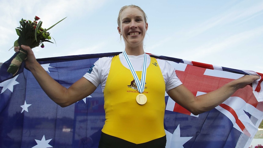 Crow shows off her gold medal