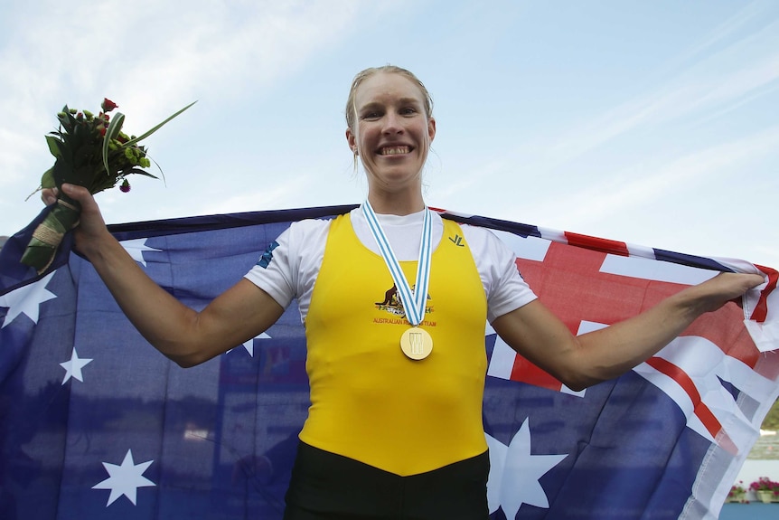 Crow shows off her gold medal