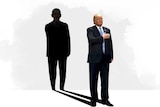 On a white background, you see Donald Trump standing with his hand on his heart, while his shadow is cast as Barack Obama.