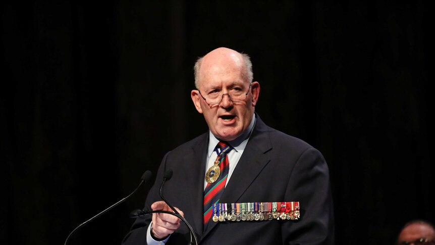 Governor General Sir Peter Cosgrove dons a military suit with medals