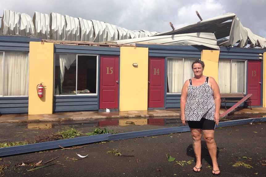 Kerry Campbell outside her trashed motel in Proserpine