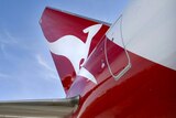 Qantas has more than doubled its full-year net profit, but says the general operating environment is extremely volatile.