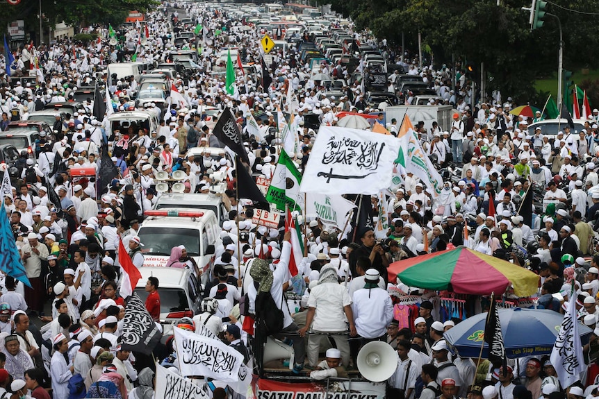 Muslim protesters march during a protest against Jakarta's Christian Governor Basuki "Ahok" Tjahaja Purnama.