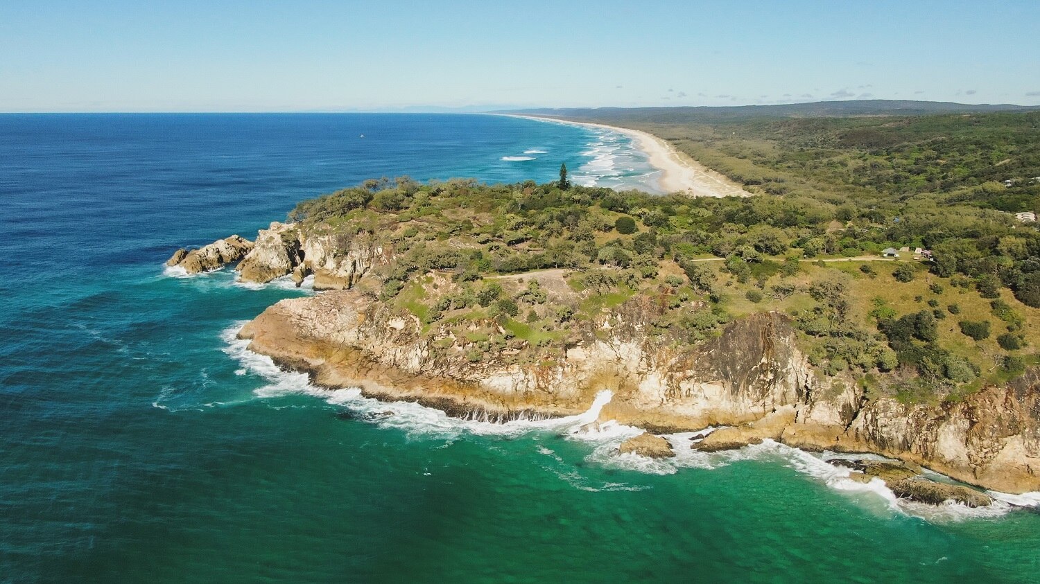 Drone photo of North Gorge and ocean at Point Lookout and Main Beach on North Stradbroke Island