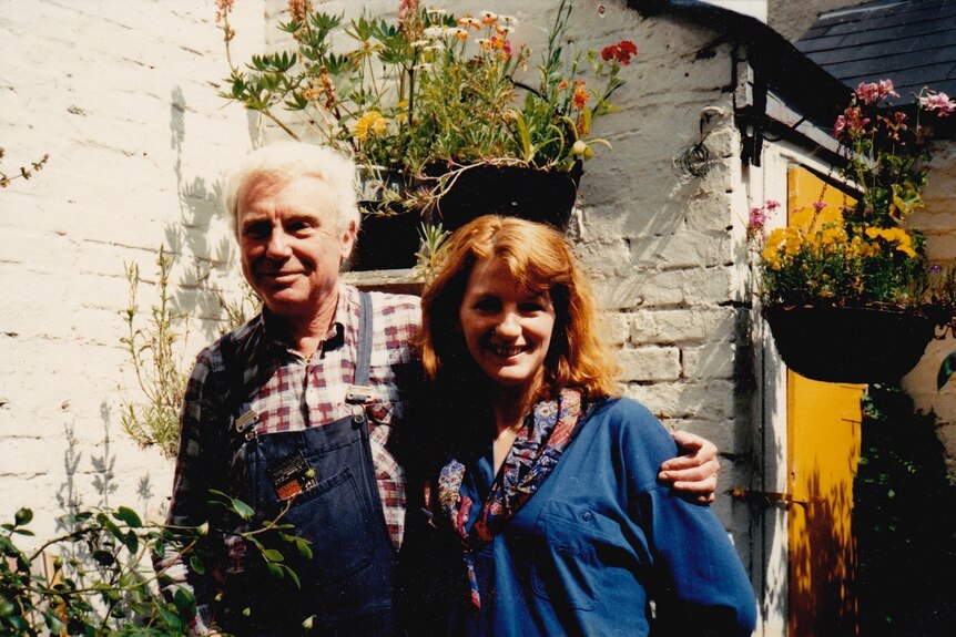 Stow with Wendy Beckett in his backyard at Kings Head Street, Harwich, around 1991.