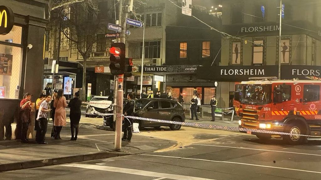 Police say a vehicle struck several pedestrians before colliding with ...