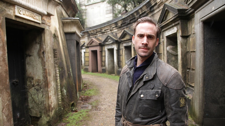 Actor Joseph Fiennes stands outside The Globe Theatre