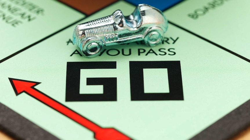 Race car on a Monopoly board