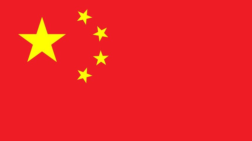 The Chinese national flag is red with one large yellow star and four smaller ones next to it.
