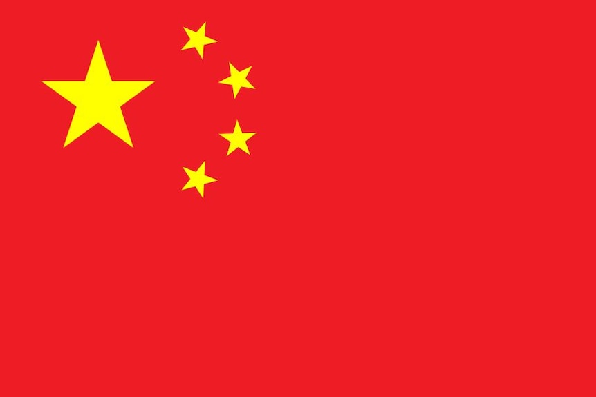 The Chinese national flag is red with one large yellow star and four smaller ones next to it.