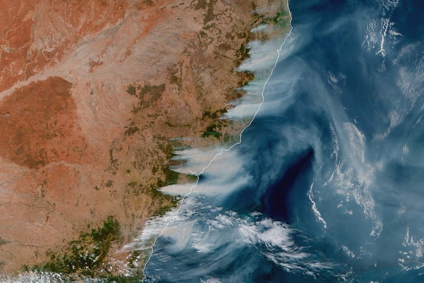 Satellite footage shows bushfires burning around New South Wales in the afternoon on December 5, 2019.