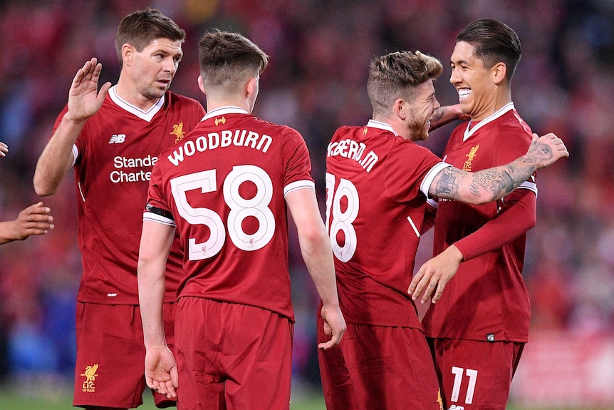 Liverpool celebrates Alberto Moreno's goal against Sydney FC