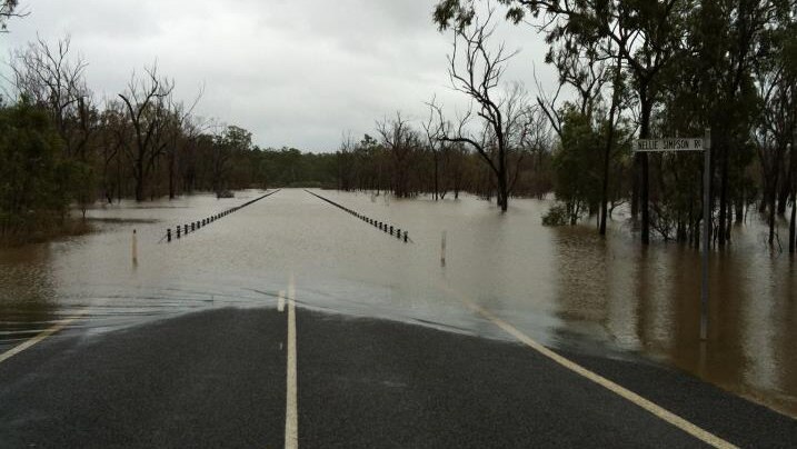 Flooded road at intersection of Nellie Simpson Road and Gladstone Monto Road in central Qld in March 2013