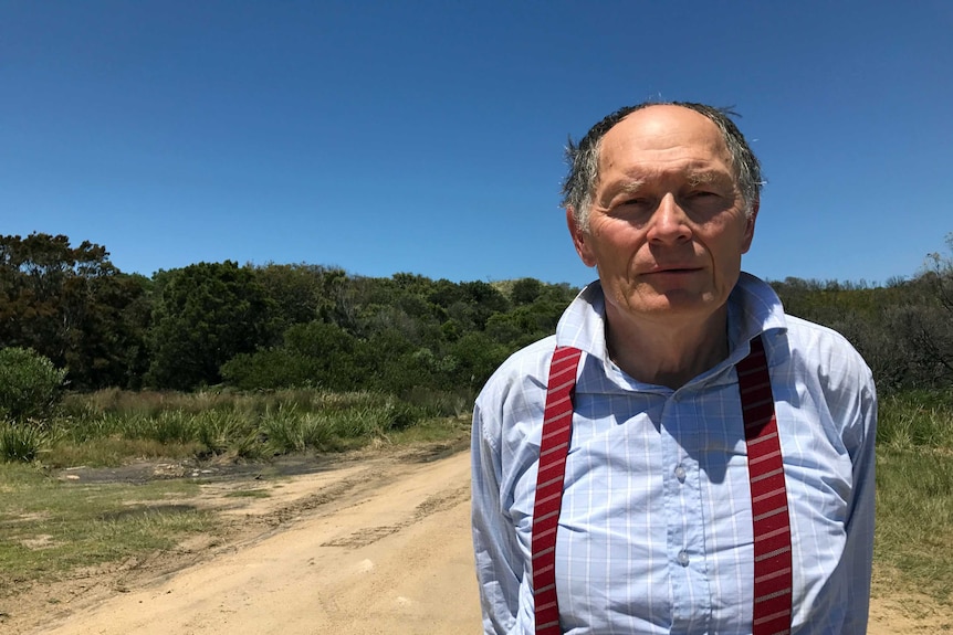 Pilot George Calka, who was forced to land his light plane in sand dunes at St Helens