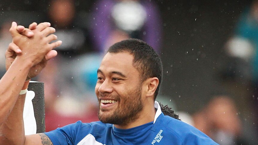 Samoa captain Tony Puletua celebrates his try over Tonga.
