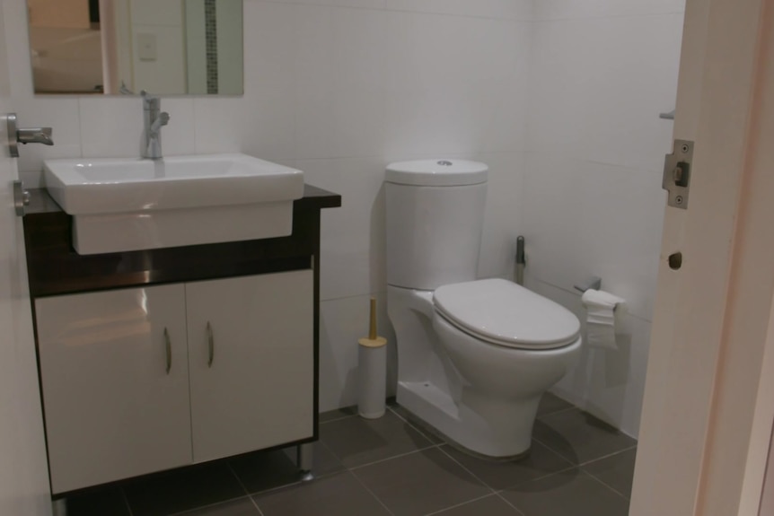 a grey and white modern bathroom