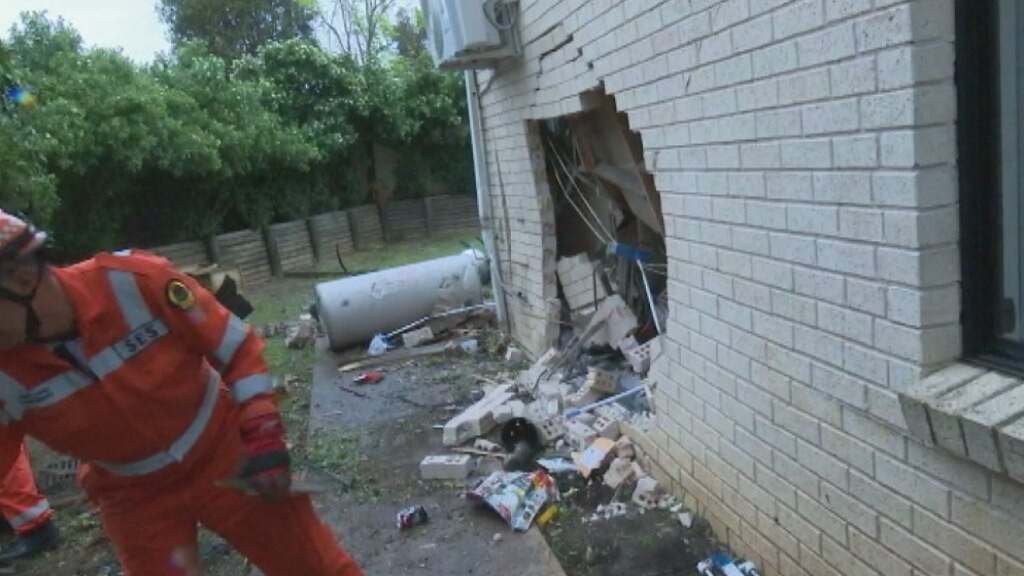 Families escape injury when cars smash through living room, bedroom of ...