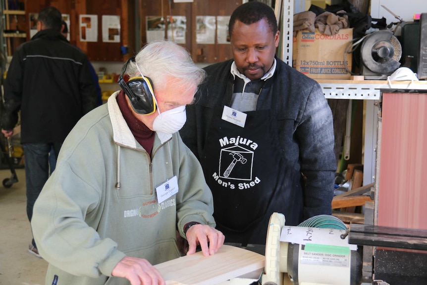 George Dobbin and Moses Nyapidi at the Majura Men's Shed