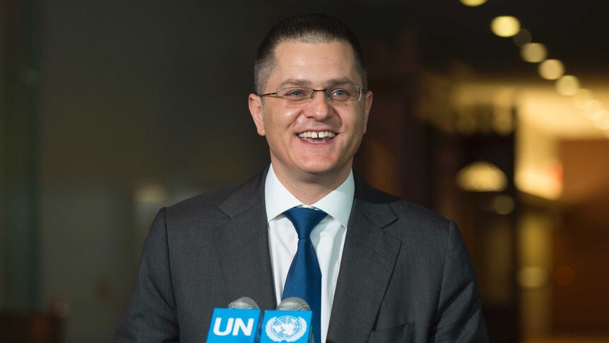 Vuk Jeremic peaks with reporters after being interviewed as a candidates for the position of UN Secretary-General