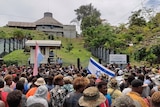 Protestors gather outside the parliament building in Honiara, Solomon Islands.