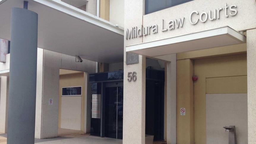 A pale building with a sign above the entrance reading "Mildura Law Courts".