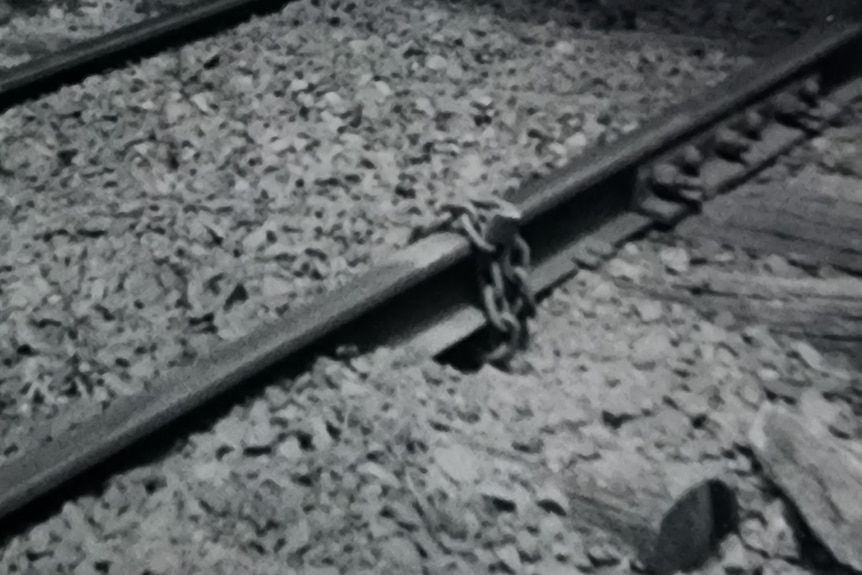 A chain placed around railway track