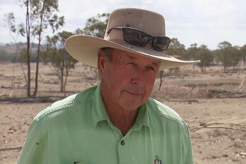 John Pratt, wearing a wide-brim hat.