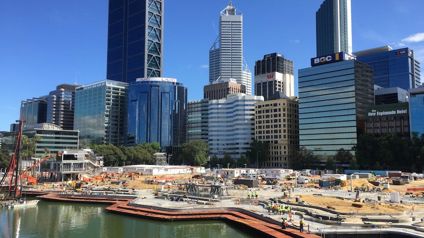 A view of the Elizabeth Quay construction site, with the Perth skyline in the background.