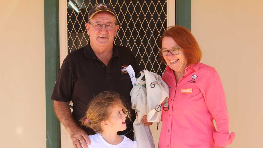Peter Rowe delivering mail to Jackie and Lucy Williams on Mount Barry Station, about 120km from Coober Pedy.