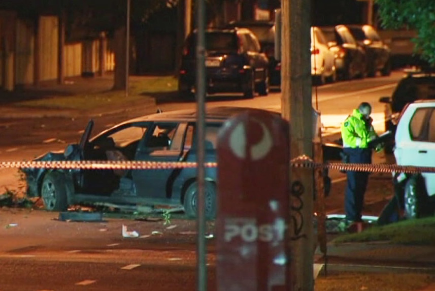 A crashed car on Victoria Street, Northcote, after a police pursuit.