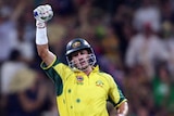 Mike Hussey shows his delight after hitting the winning runs