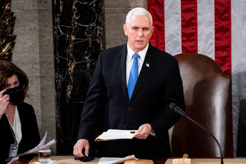 Mike Pence stands in Congress.