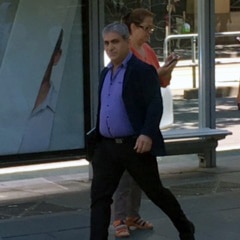 Wasim Buka walking outside the county court in Melbourne.