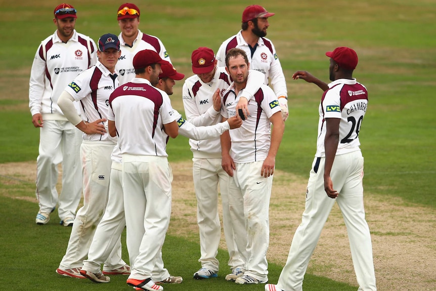 Steven Crook celebrates an Australian wicket