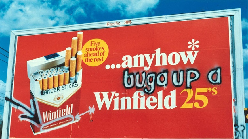Winfield billboard advertisement graffitied by BUGA UP.