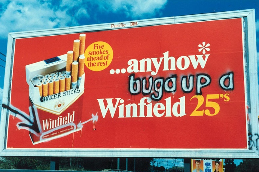 Winfield billboard advertisement graffitied by BUGA UP.