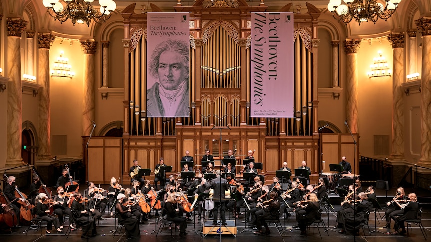 The Adelaide Symphony Orchestra onstage at the Adelaide Town Hall, with conductor Douglas Boyd.