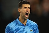Novak Djokovic yells.