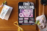A poster with 'Find Madeleine' on it taped to a door with greeting cards and teddy bears stuck near it
