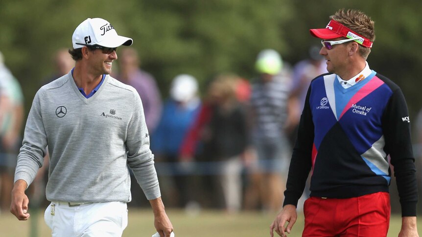 Poulter holds slight lead over Scott