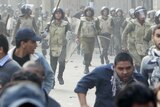 Eight people have died after protesters clashed with police and army forces in Tahrir Square.