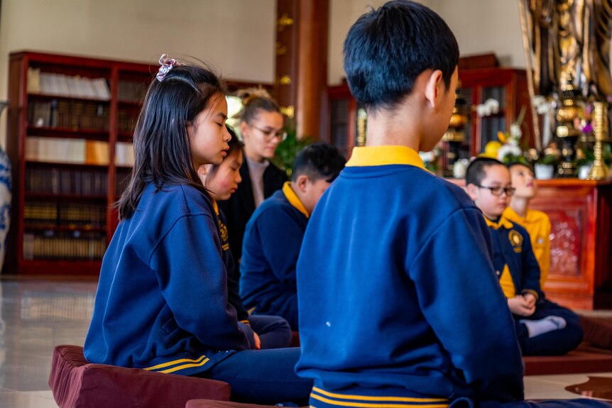 A photo of kids at the Buddhist school.